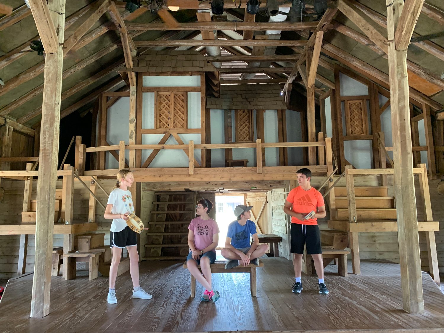 The Crystal Theatre Shakespeare Ninja program has had a decade-long partnership with Camp Shakespeare at Winedale. This year, two Shakespeare Ninjas are among the 14 first-session campers: Lena Salazar, second from left, and Miguel Moreno, far right. The Winedale Theatre barn, where the camp is held, has been remodeled to resemble the Globe Theatre in Great Britain.
